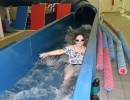 Girl coming down water flume