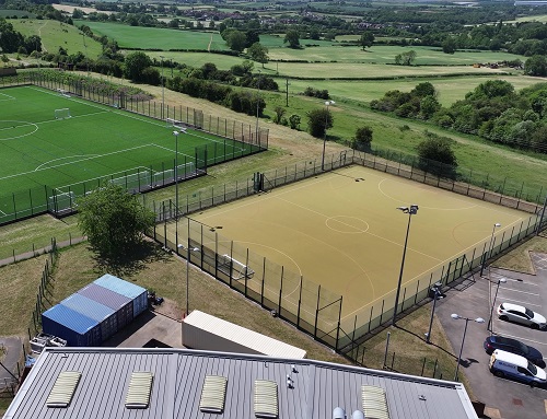 aerial view of redundant astro turf pitch where the new tennis facility will be sited